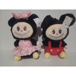 Cute Plush Toy Monsters Dressed As Mickey and Minnie.